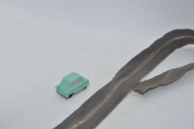 High angle view of container on table against white background