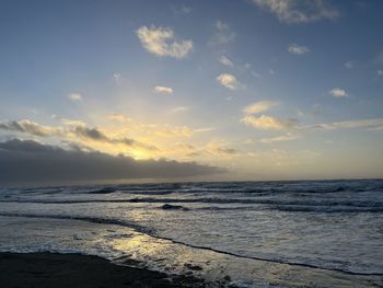 Scenic view of sea against sky during sunset