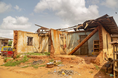 Abandoned house against sky