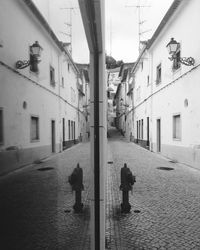 People walking on street in city