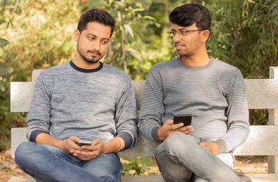 Young man using mobile phone