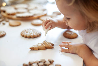 Close-up of girl making cookies