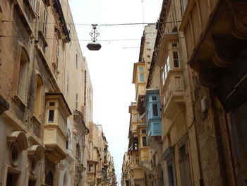 Low angle view of buildings against sky