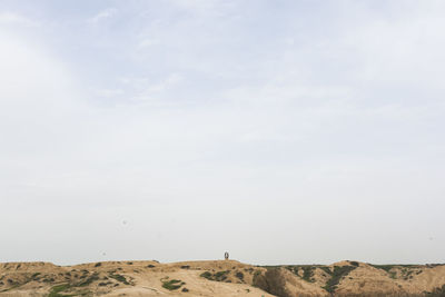 Scenic view of desert against sky