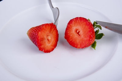 High angle view of strawberries on table