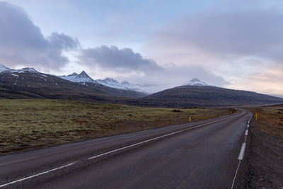 Empty road against sky