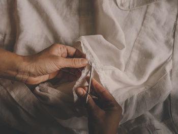 Close-up of woman holding hands