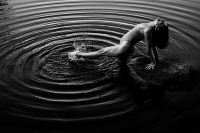 High angle view of man swimming in lake