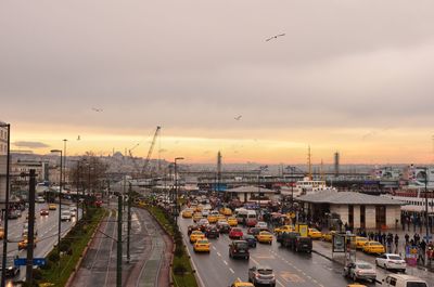 View of city against sky during sunset