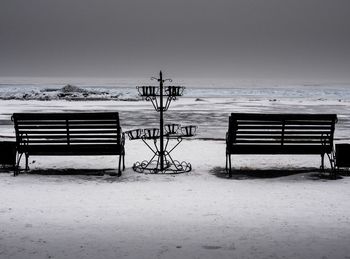 Empty benches in a row