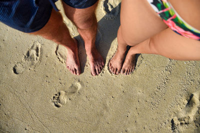 Low section of people on beach