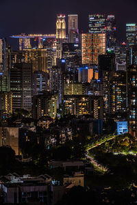 Illuminated buildings in city at night