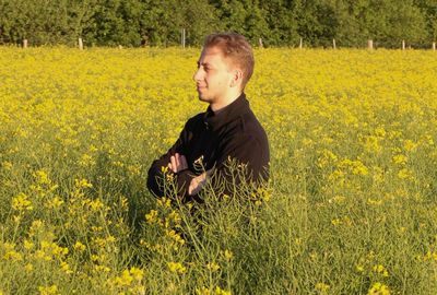 Full length of man standing on field