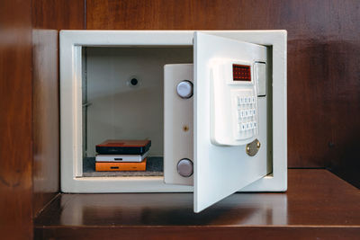 Security external hard drive in open metal safe. 