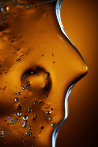 Full frame shot of orange liquid