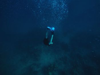 Person swimming in sea