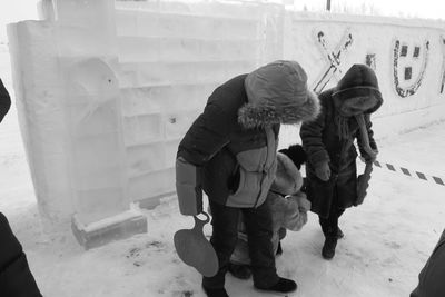 People standing in snow