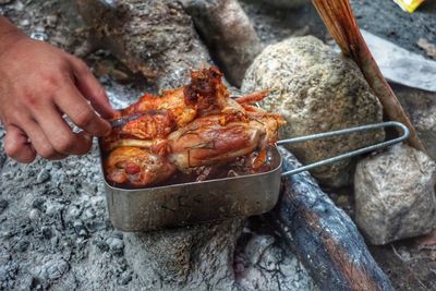 Close-up of person preparing food