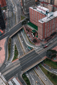 Aerial view of vehicles on road in city