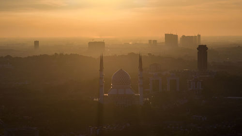 View of city at sunset