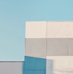 Low angle view of building against clear blue sky