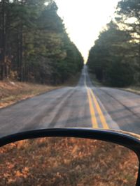 Road amidst trees