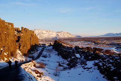 Scenic view of mountains against sky during winter