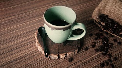 High angle view of coffee cup on table