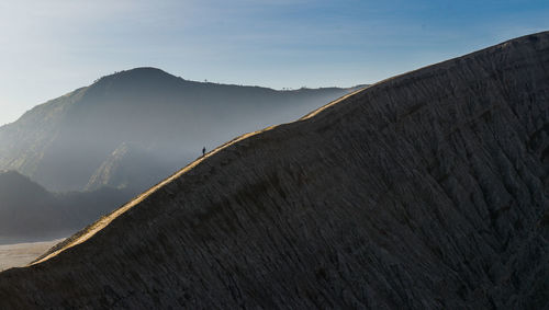 Scenic view of mountain range against sky