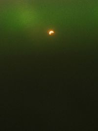 Low angle view of moon in sky at night