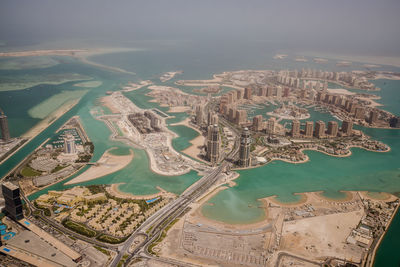 Aerial view of cityscape against sky