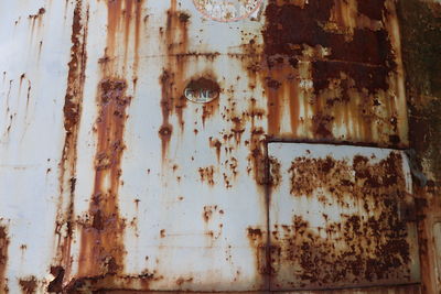 Close-up of rusty old damaged building