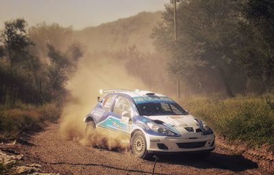 View of car on dirt road