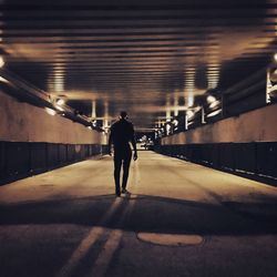 Full length of woman in tunnel