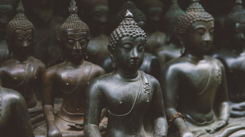 Close-up of buddha statue in temple