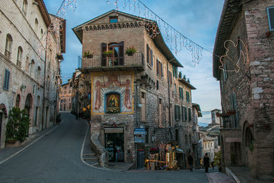 View of beautiful alley in the historic center of assisi at christmas time