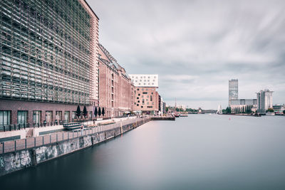 Buildings in city against sky