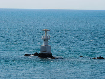 Scenic view of sea against clear sky