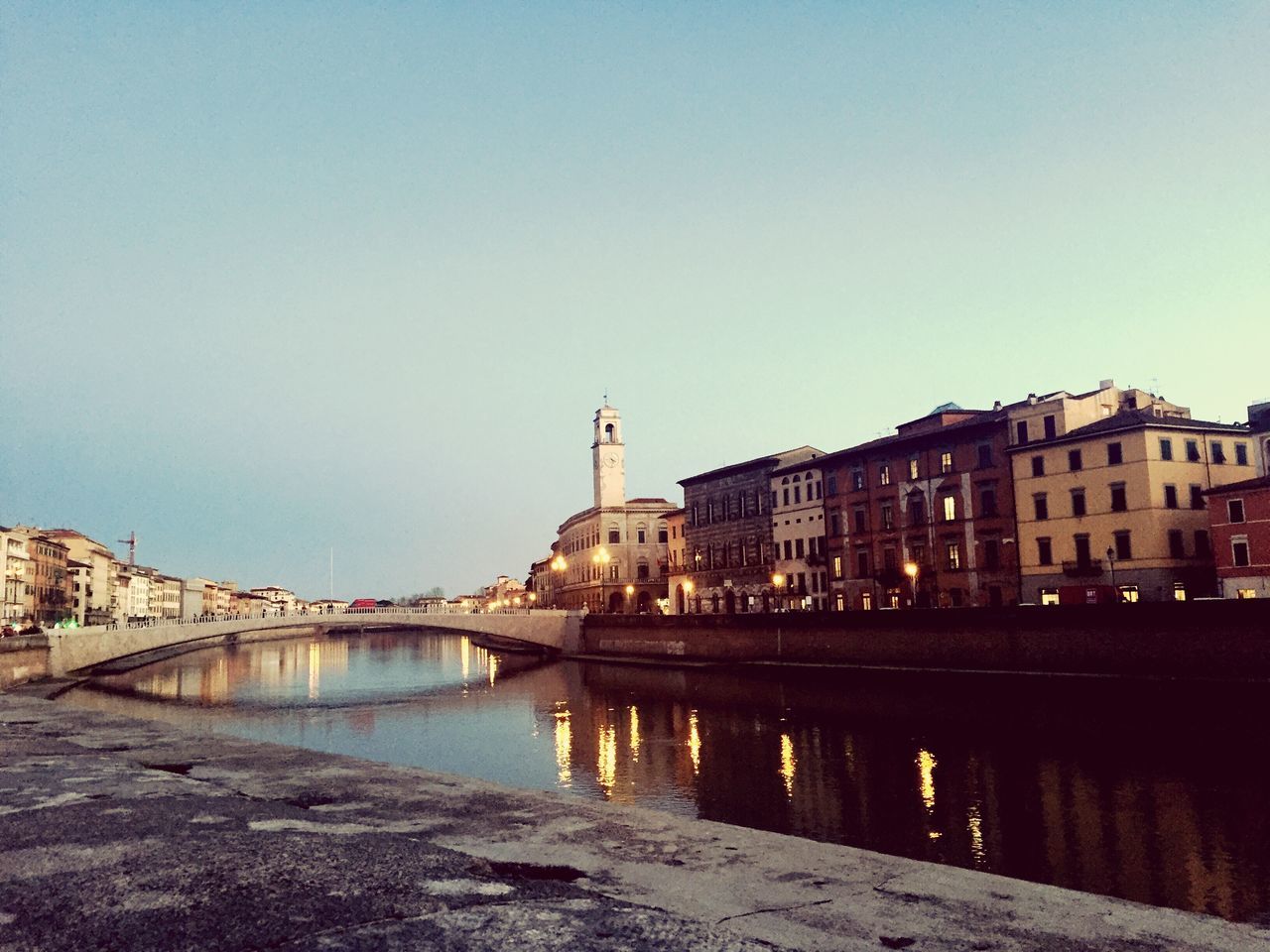 architecture, built structure, clear sky, building exterior, water, copy space, connection, river, bridge - man made structure, reflection, city, waterfront, canal, bridge, blue, arch, arch bridge, outdoors, travel destinations, building