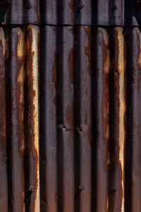 Very rusty corrugated metal surface