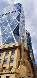 Low angle view of modern building against sky