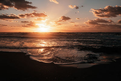 Scenic view of sea against sky during sunset