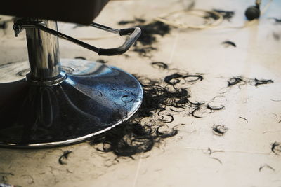 High angle view of hair on floor at salon