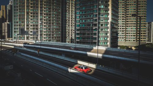 High angle view of car on road elevated road against buildings