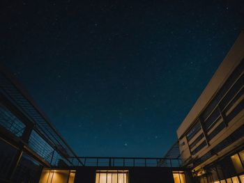 Low angle view of building against sky at night