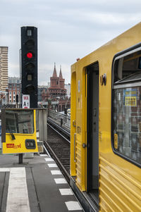 Train against sky in city