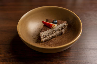 High angle view of cake in bowl on table