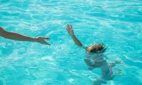 People swimming in pool