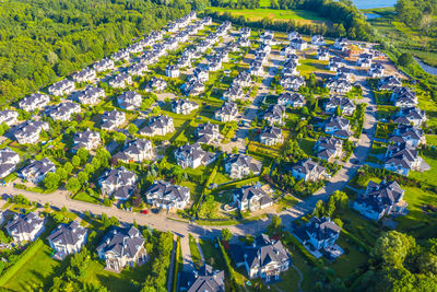 Aerial view of luxury homes properties. taken during a sunny summer day.