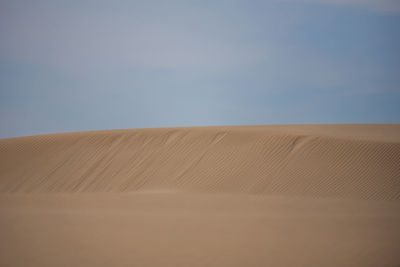 Scenic view of desert against sky